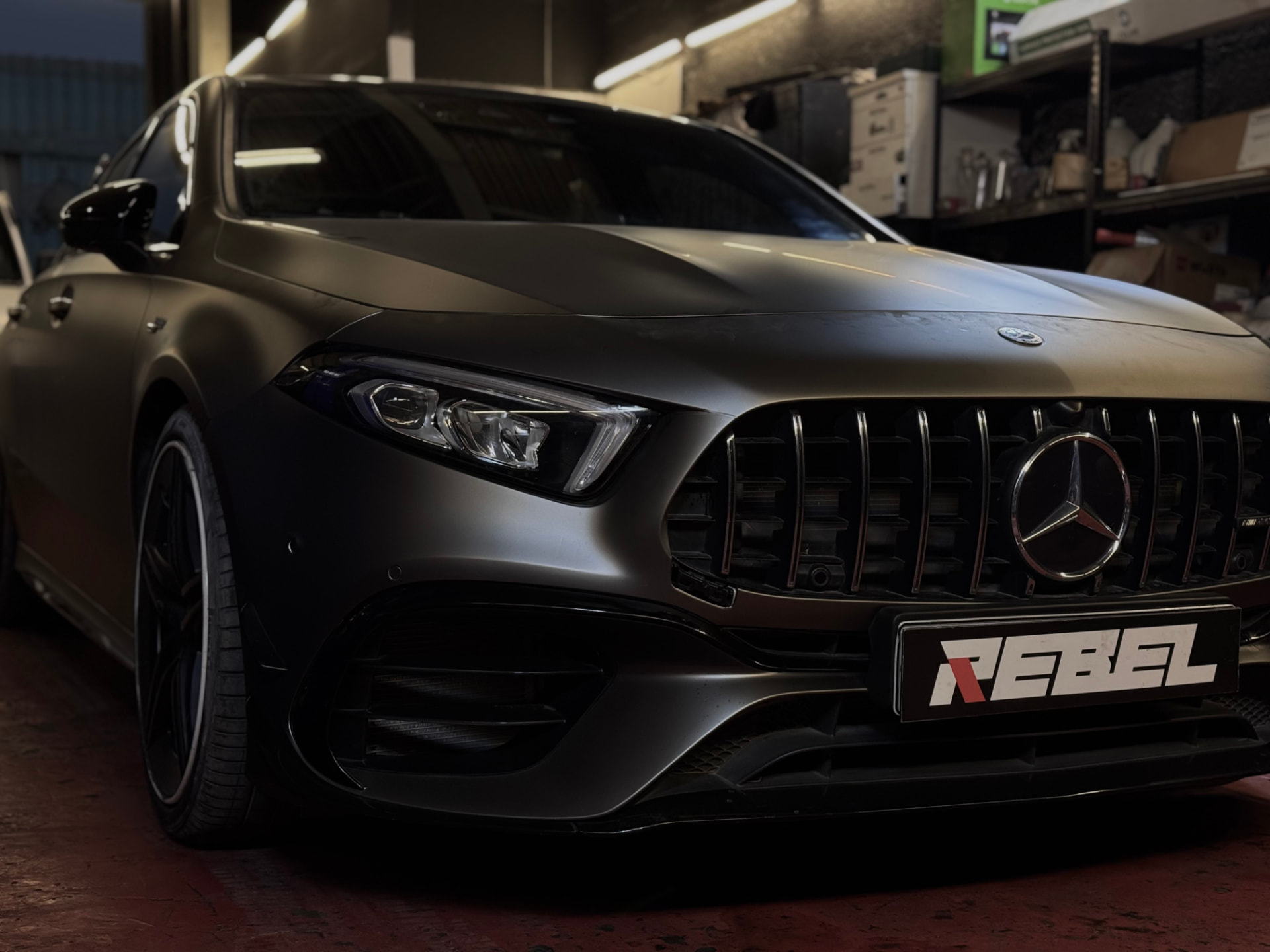 Matte black Mercedes-AMG inside the Rebel Motorworks workshop
