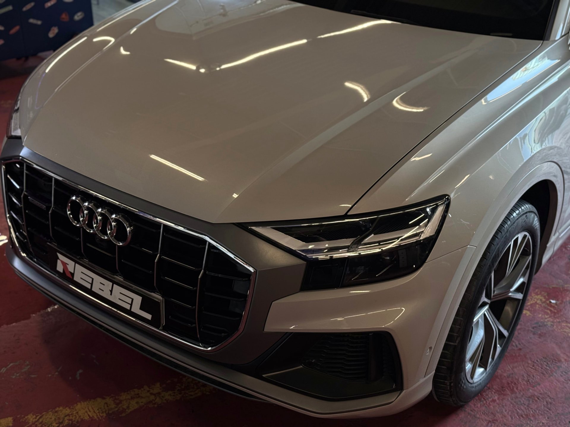 Grey Audi with Rebel Motorworks plate after service in Dubai