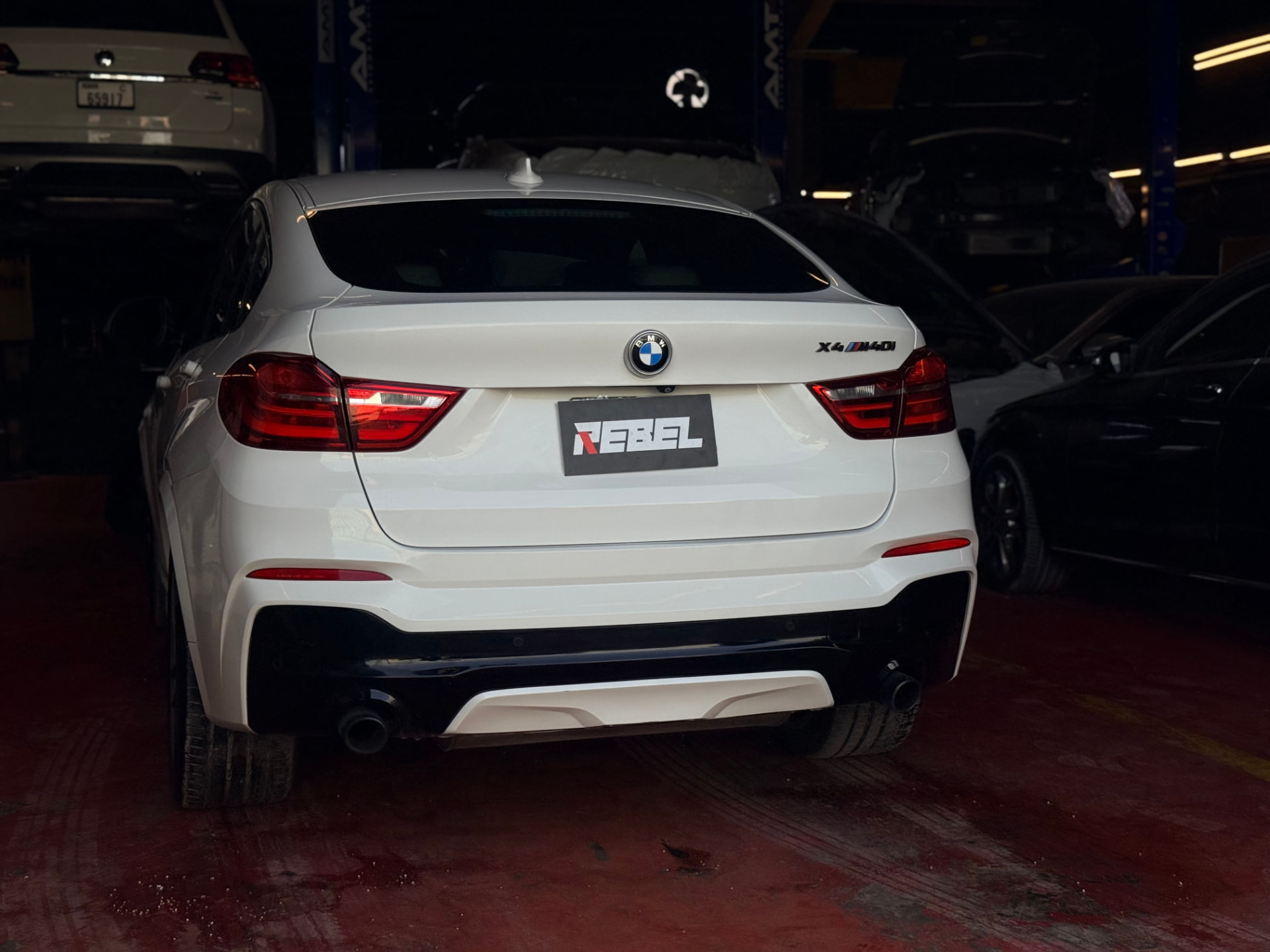 White BMW X4 M40i completed at our Al Quoz luxury car workshop