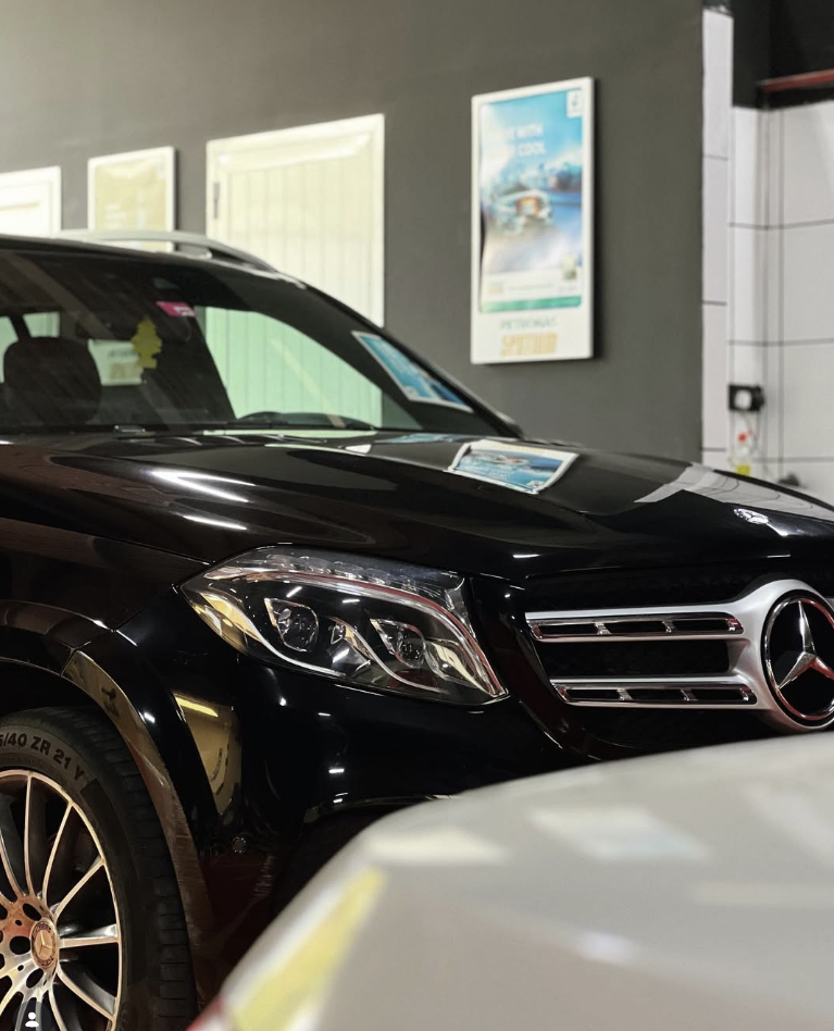 Mercedes-Benz GLS receiving premium service inside Rebel Motorworks Dubai workshop
